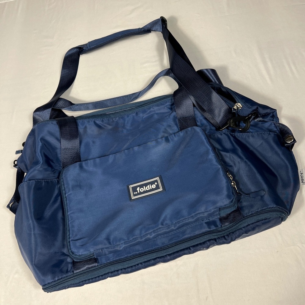 The Foldie Navy Blue Foldable Travel Duffel Bag Expandable Weekender Gym Bag